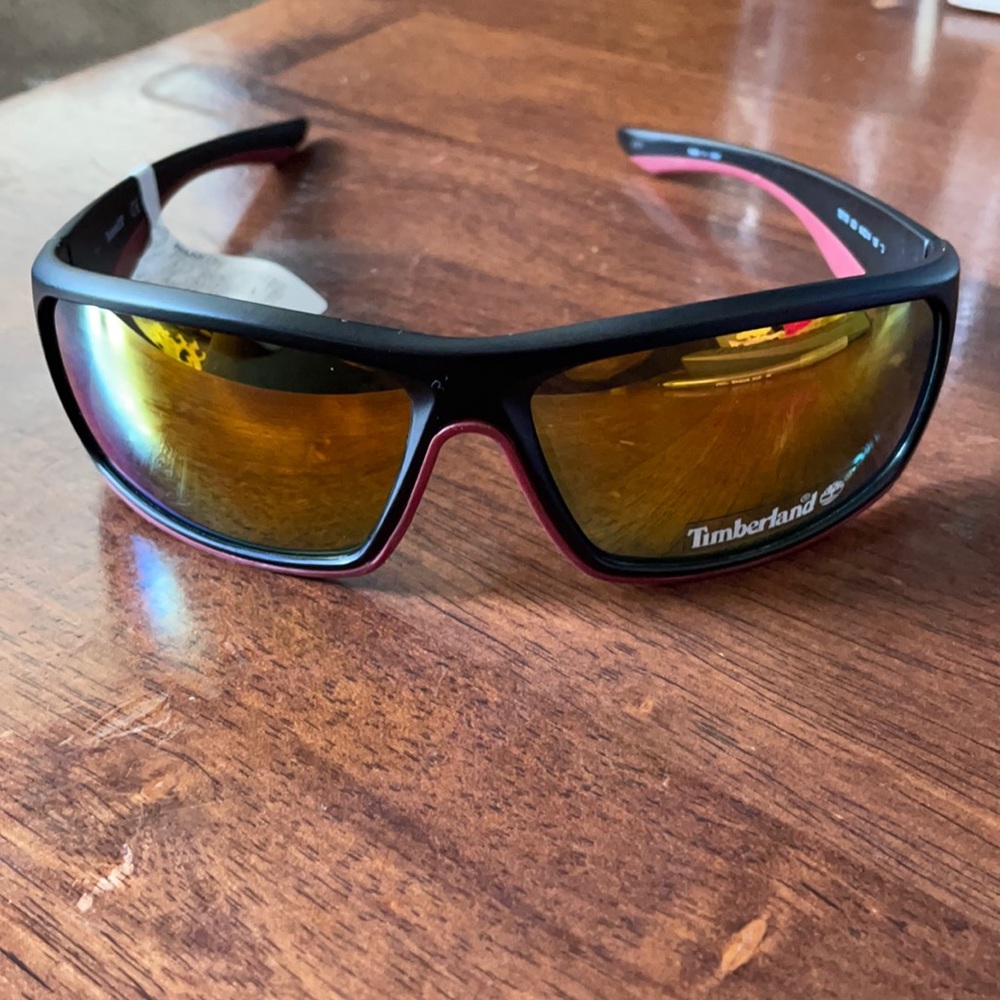 Men’s Timberland sunglasses.  Black w red line